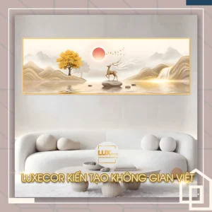 Bức tranh tráng gương hươu vàng thác nước phong thủy treo trên ghế sofa phòng khách hiện đại.